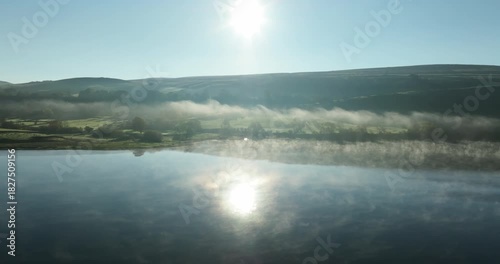 Flying over misy lake at sunrise