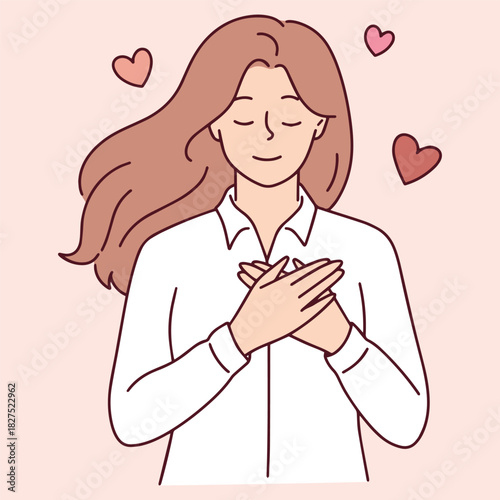 Smiling girl presses palms to her heart feeling self-love and romantic affection. Young woman surrounded by flying hearts expresses kindness and positive emotions.