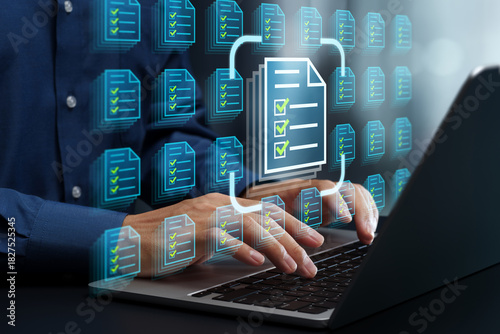 Legal document management system. Business document archiving and storage. Approval workflow automation and records compliance. Businessperson using laptop computer for file retrieval.