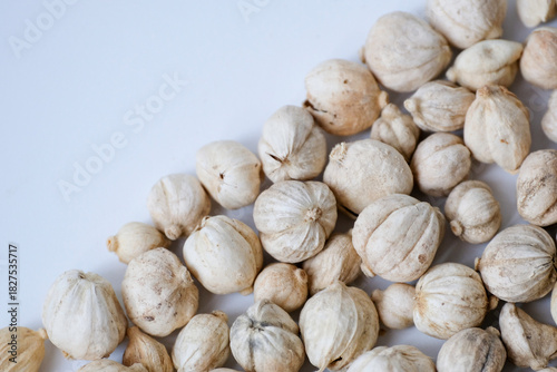 Dried white cardamom isolated on white background