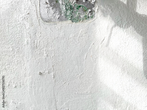 Shadow of Broken Washbasin Drain Pipe on Damped, Musty Old Painted Wall with Sunlight. Closeup Textured Exterior Toilet Wall in Room at Dhamma Retreat Center, Saraburi, Thailand. 25 OCT 2025. A.M.