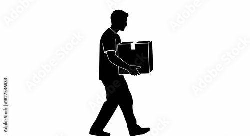 Silhouette of a man walking while carrying a cardboard box.