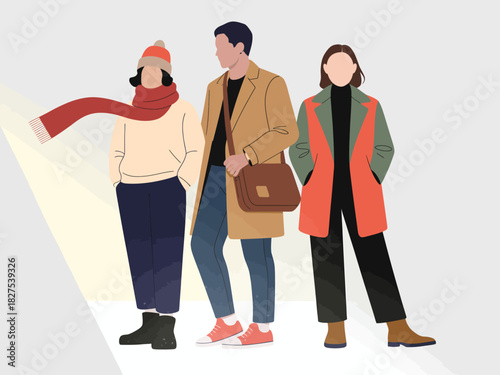 This stylish trio of people dressed in casual yet fashionable outfits captures urban coolness, highlighting modern fashion trends and the spirit of contemporary street style.