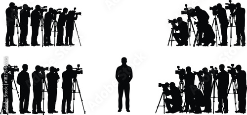 Silhouettes of professional press and photojournalists with video and photo cameras on tripods surrounding 