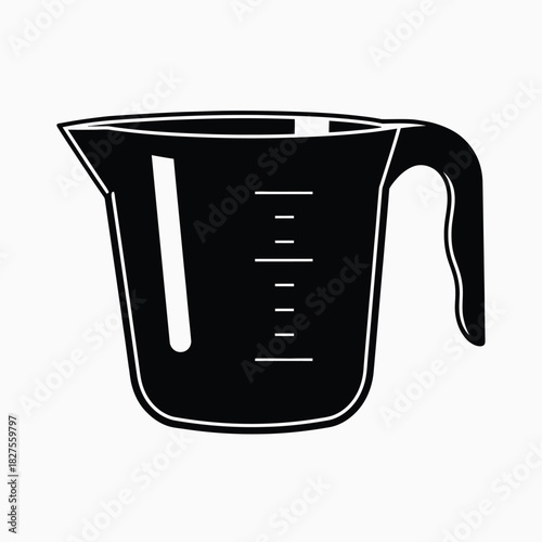 Black measuring cup with measurement markings
