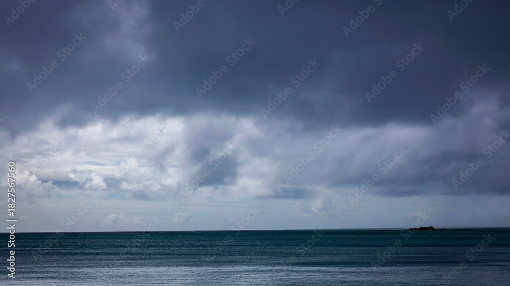 Fototapeta premium Dark with Dramatic blue sky and dark as Dramatic blue sea color and dark storm raining cloud background