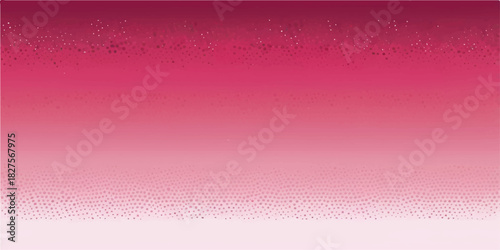 Joyful young couple laughing while looking at a mobile phone outdoors