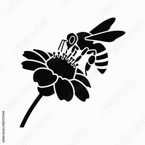 Black silhouette of a bee collecting pollen from a flower