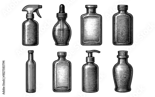 Set of vintage engraved glass bottles with various caps in black and white