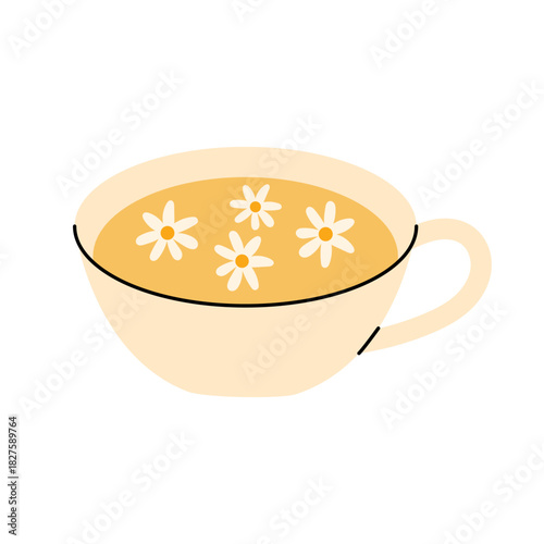 Chamomile tea cup with floating daisy flowers in warm cozy style
