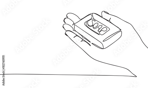 Continuous line drawing of a hand holding a bar of soap