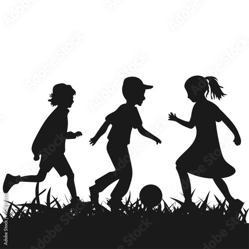 Children playing on the street running with a ball on the grass black silhouette of three children
