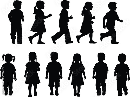 Silhouette of children walking and standing in a group formation