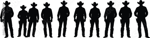 Silhouette of a group of cowboys standing in a row