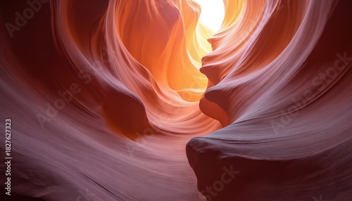 Abstract wavy patterns in Antelope Canyon rocks. Smooth sandstone formations, light and shadows. National landmark nature landscape. Arizona desert geology art. Texture design with light and color.