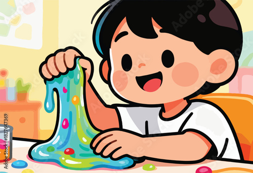 A cheerful child plays with colorful slime, pulling it with hands, face bright, table view