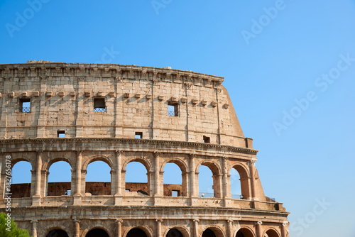View of the Roman Colosseum in Rome at sunset.