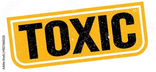 TOXIC text written on yellow-black stamp sign.