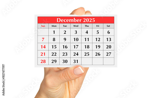 Page of the annual monthly calendar december 2025 in hand. Isolated on transparent png
