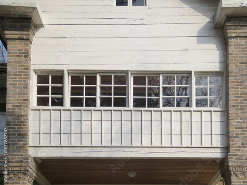 Photography TypicaI residential house exterior in urban South Korea, showing everyday urban living environment