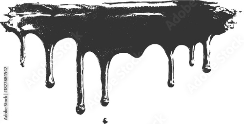 Dark black paint dripping from a textured horizontal surface liquid