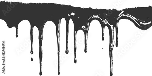 Dark gray paint dripping down from a textured surface onto a white background liquid
