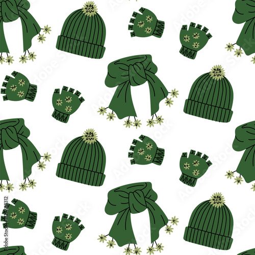 Seamless pattern with cute winter hats, scarves, and gloves knitted in green tones. Colorful flat texture. Perfect for seasonal clothing, gift packaging, cozy textiles, and cold-weather promotions