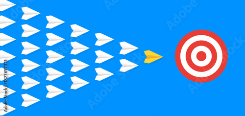 Yellow paper plane leading a group of white planes toward a target, symbolizing goal setting, focus, and achieving success