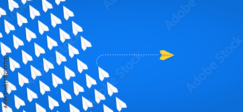 Yellow paper plane taking a different path while white planes follow, symbolizing thinking differently, changing paths, and embracing new directions