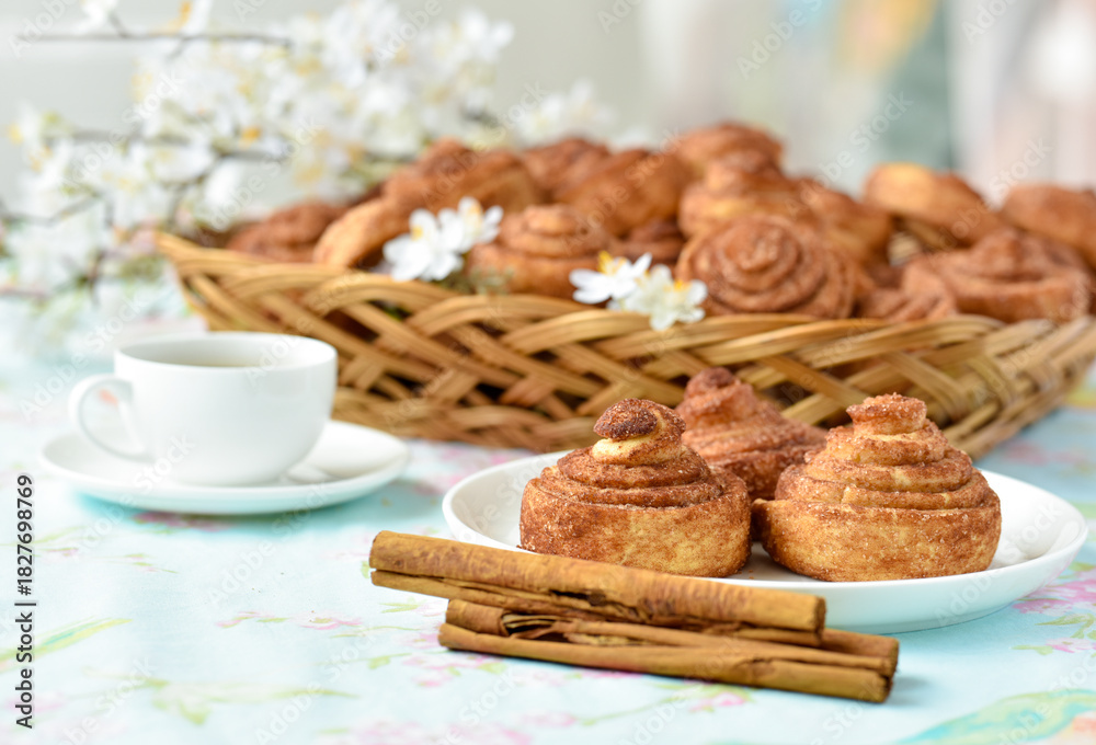 Fototapeta premium Sweden cinnamon buns and cup of tea