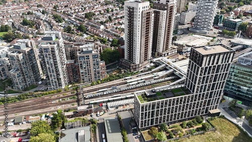 Train aproching station Croydon town centre south London UK drone,aerial