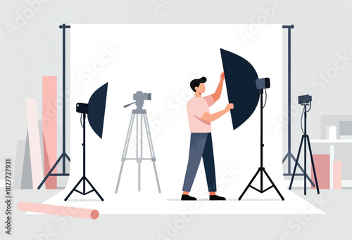 Illustration depicts a studio scene with a person adjusting a softbox light, camera equipment, and backdrops