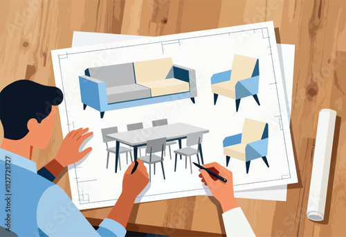 An interior designer draws furniture plans on paper laid on a wooden table. A rolled blueprint rests nearby