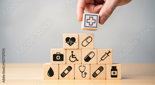 Hand holding a wooden cube with alphabet letters used as a business text concept or educational toy block for learning abc word signs