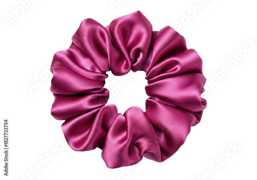 Bild auf Leinwand Isolated scrunchie hair tie in magenta color with soft shiny texture, trendy hai
