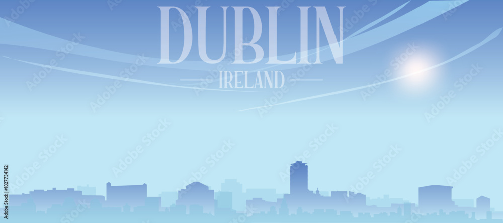 Obraz premium Blue panoramic poster of the city skyline with misty background buildings and clouds of DUBLIN, IRELAND