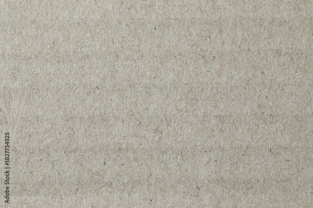 Fototapeta premium Kraft paper texture, macro close-up. Natural, warm, fibrous surface suitable for use as a background in design and craft projects
