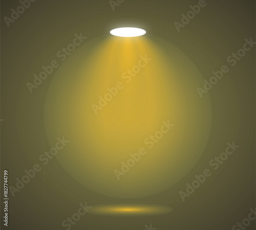 Yellow spotlight shining on dark background
