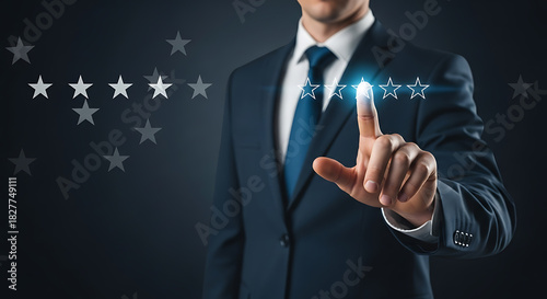 Man in suit touching glowing five star rating interface on a dark background image