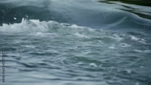 Close Up View of a Fast Flowing River Current.