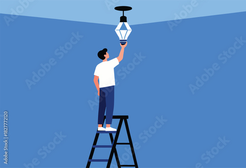 A person on a ladder reaches for a geometric light fixture against a blue wall