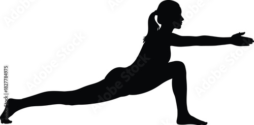 Silhouette of a woman in a lunge yoga pose