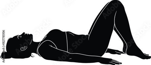 Silhouette of a person lying on their back with bent knees