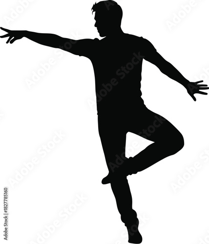 Silhouette of a male dancer in a dynamic pose