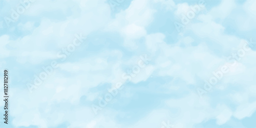 Beautiful bright blue sky cloudscape with fluffy white cumulus clouds on a sunny summer day