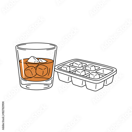 Glass of rum with ice cubes beside ice cube tray  