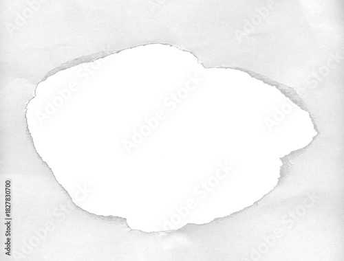 Hole in paper with torn edges isolated on transparent background.
