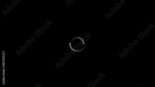 Loading animation of a looped waiting loop. White snowflakes move and rotate in a circle against a black isolated background, approaching and receding. Moving to the next stage. Buffering.
