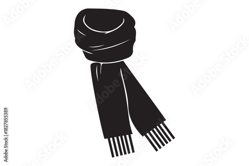 A stylish black knitted scarf with tassels neatly folded and isolated on a white background isolated on white background