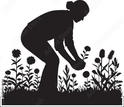 Silhouette of a gardener tending to flowers in a vibrant garden landscape during daytime